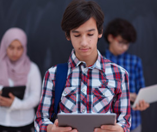 teen using tablet