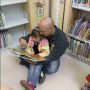 family reading at ingleside branch